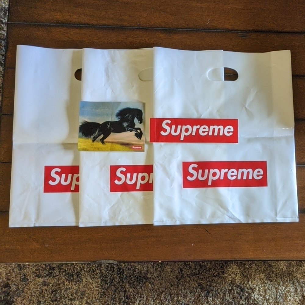 3 Supreme Bags & 2 Supreme Stickers